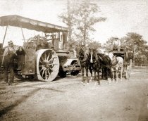 Steam tractor and 4-horse team
